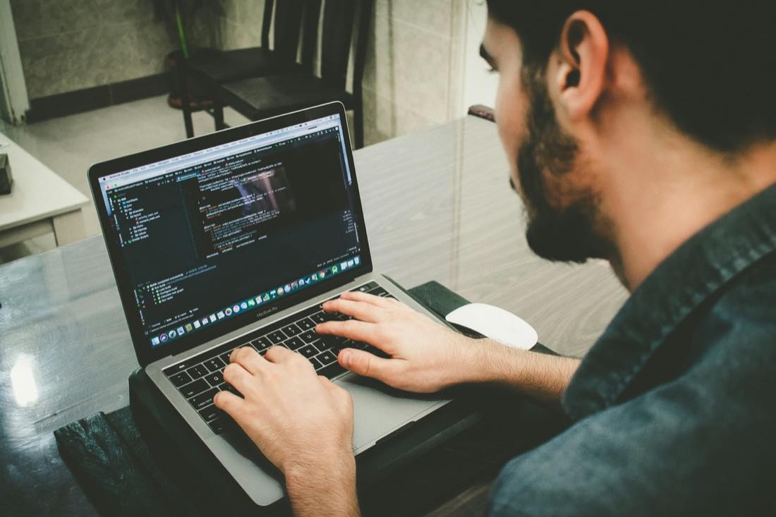 Software developer engineering a custom application